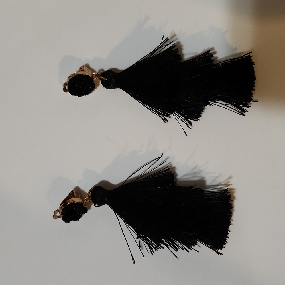Black and gold fringed clip on earrings